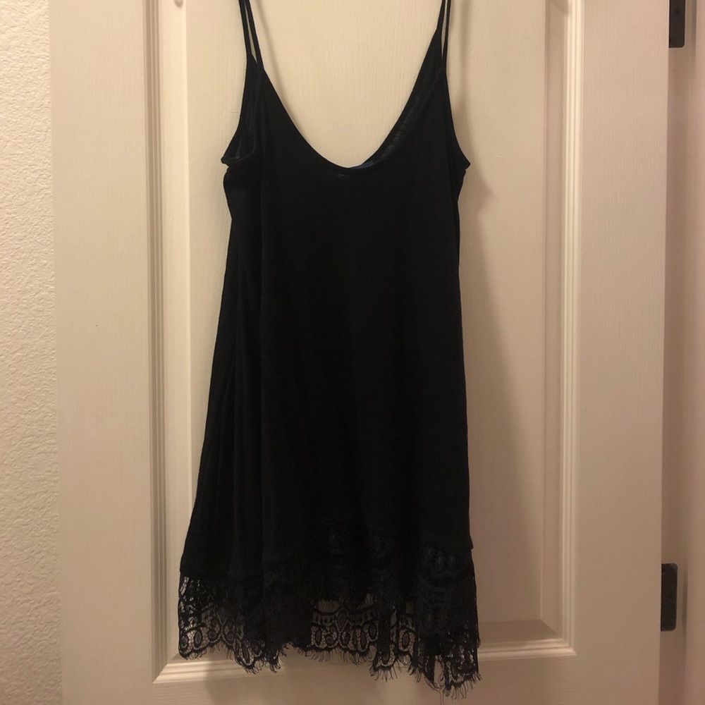 Flowy black top with lace detail